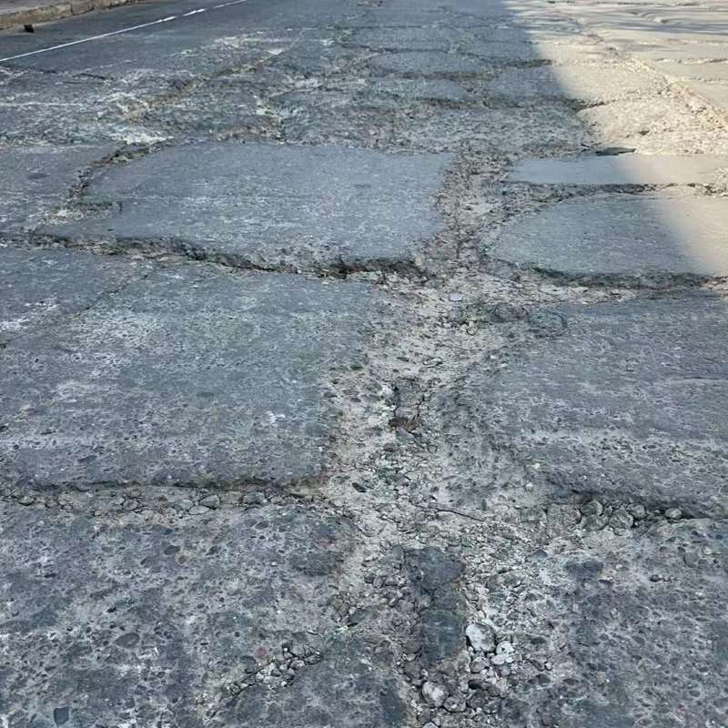 岑溪路面起砂露石子修补料